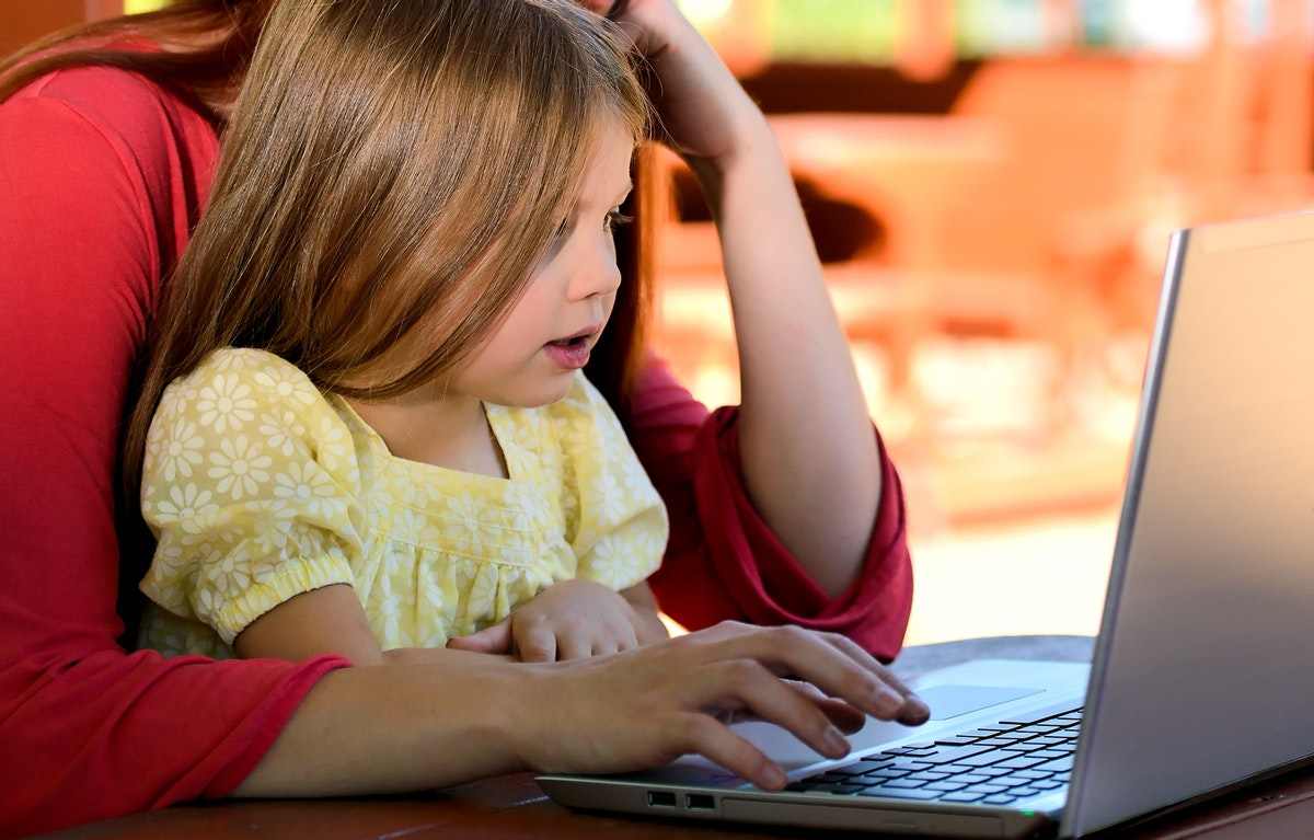 Baby girl using laptop